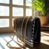 45f863e4-4859-4019-92aa-ef8ec10df487.jpeg The Noir Monogram Crossbody