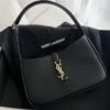 5c49b99e-0eda-4fc1-9469-d4c81e66282e-1.jpeg The Noir Structured Handbag