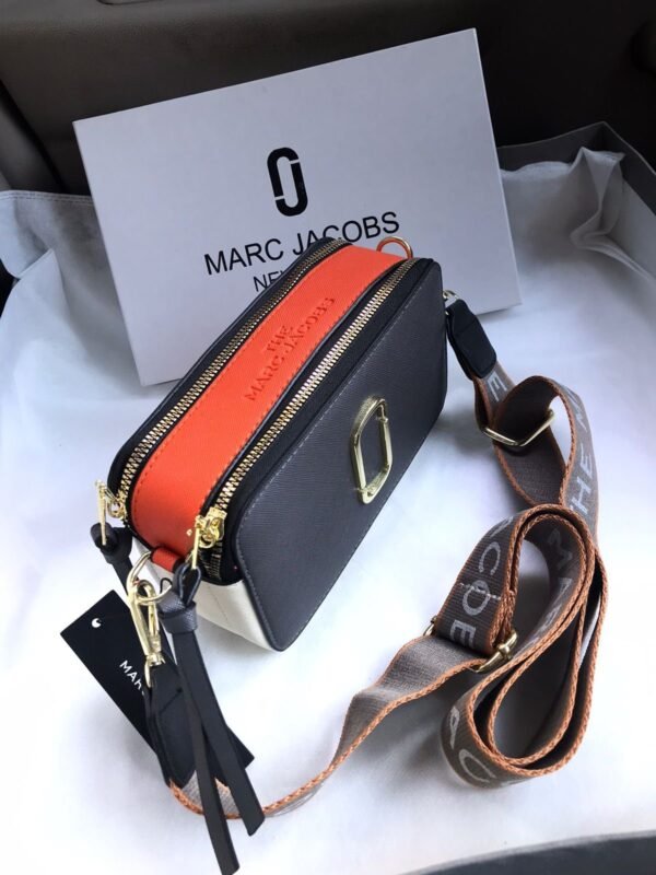 619f1fbf-cb1c-46f1-a542-e213a70bf0a2.jpeg The Noir Signature Sling