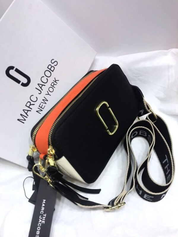 8314f3ff-77d6-4f3a-ab82-7eef4ceefc8a.jpeg The Noir Signature Sling