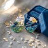 2026/09/1000136529.jpg Peacock Blue & Green Enamel Swan Stud