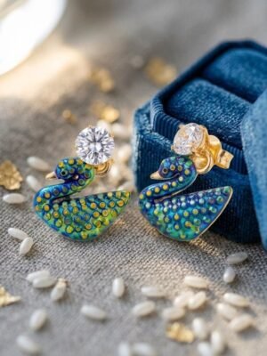 2026/09/1000136529.jpg Peacock Blue & Green Enamel Swan Stud